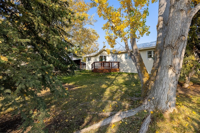 view of yard featuring a deck