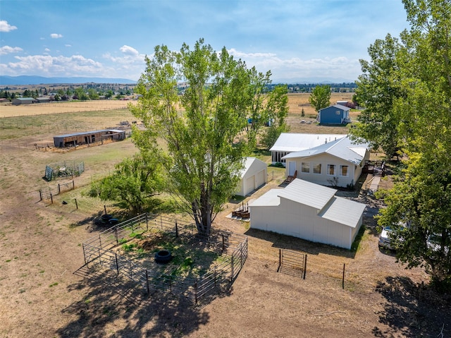 bird's eye view featuring a rural view and a mountain view