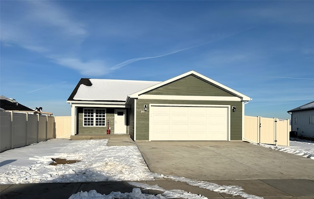 view of front of home with a garage