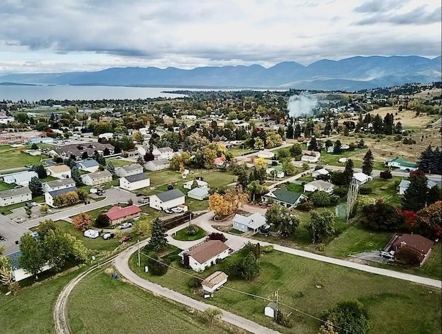 drone / aerial view featuring a mountain view