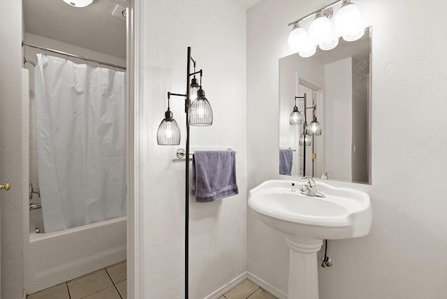 bathroom with shower / tub combo and tile patterned floors