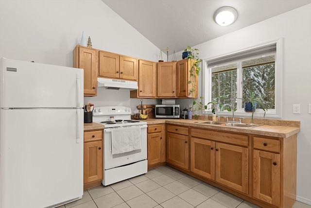 kitchen with white appliances, sink, light tile patterned floors, and lofted ceiling