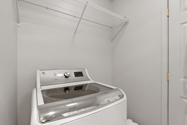 washroom featuring washer / dryer