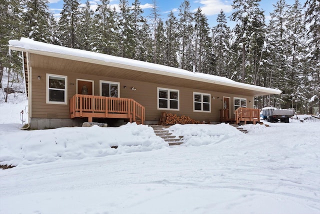 view of snow covered house