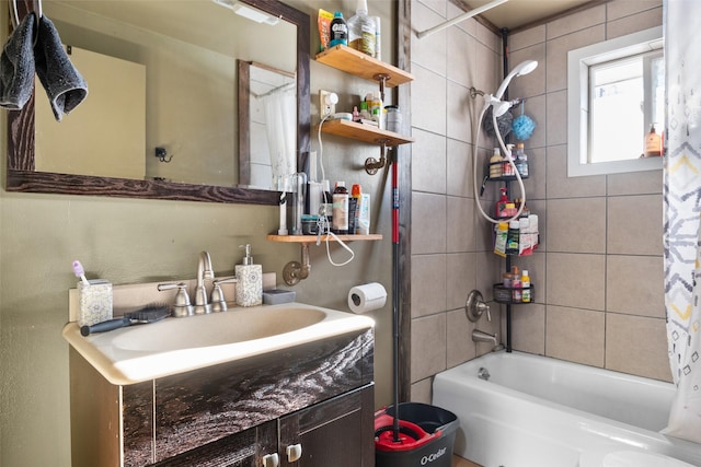 bathroom featuring vanity and shower / bath combo