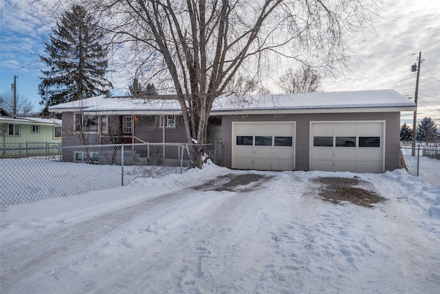 single story home with a garage