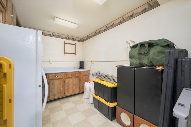 kitchen featuring white fridge