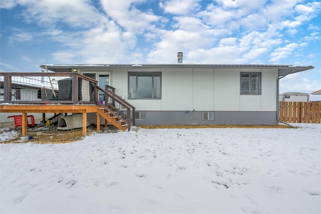 view of snow covered property