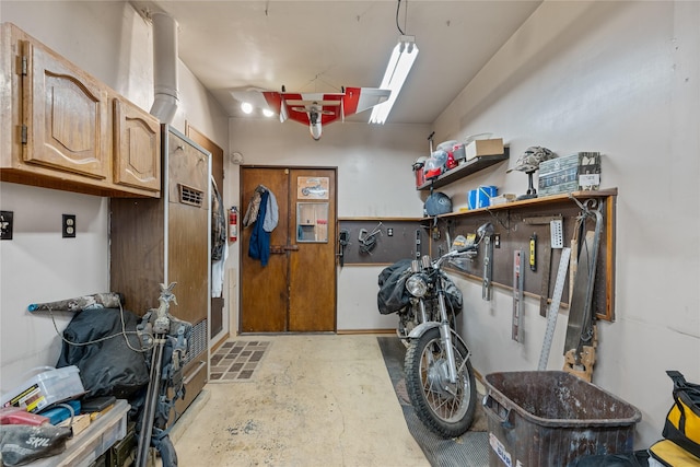 laundry room with a workshop area