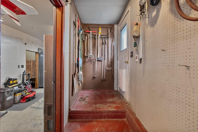 corridor featuring concrete floors