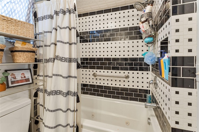 bathroom featuring shower / bath combination with curtain and toilet