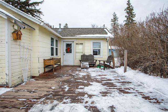 view of snow covered deck