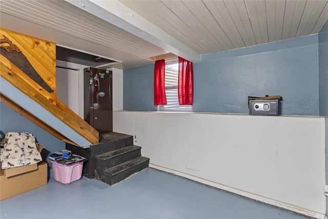 basement featuring wood ceiling