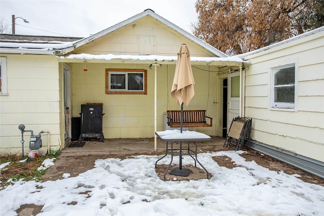 view of snow covered property