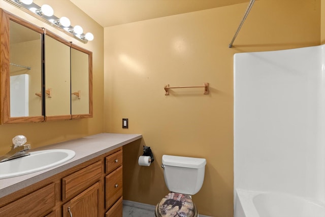 full bathroom with shower / tub combination, vanity, and toilet