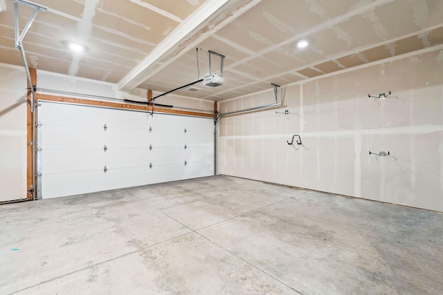 garage featuring a garage door opener