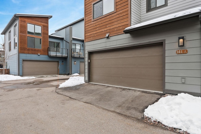 view of snow covered garage