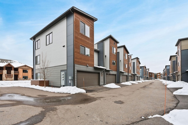 141 Hawthorne Ct Unit A, Whitefish, MT 59937 - view of asphalt road featuring a residential view