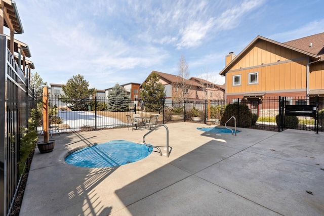 view of pool featuring a patio