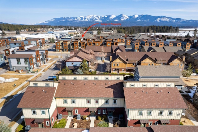 drone / aerial view featuring a mountain view