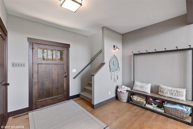 foyer with light hardwood / wood-style floors