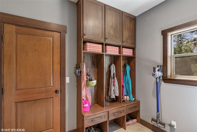 mudroom featuring light tile patterned floors