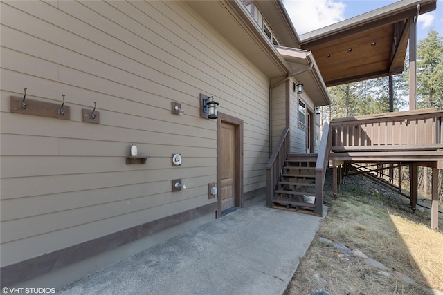 view of side of home featuring a deck