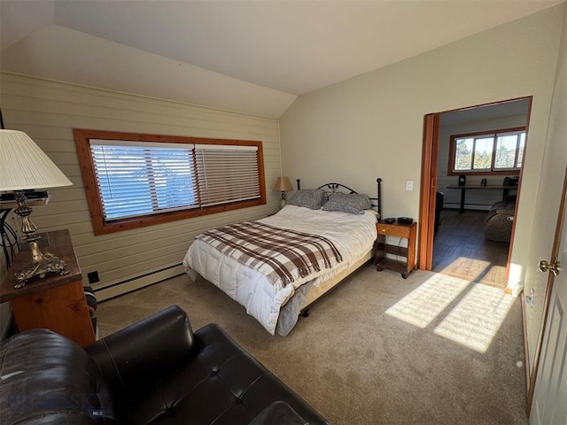 bedroom with lofted ceiling, a baseboard radiator, carpet, and wooden walls