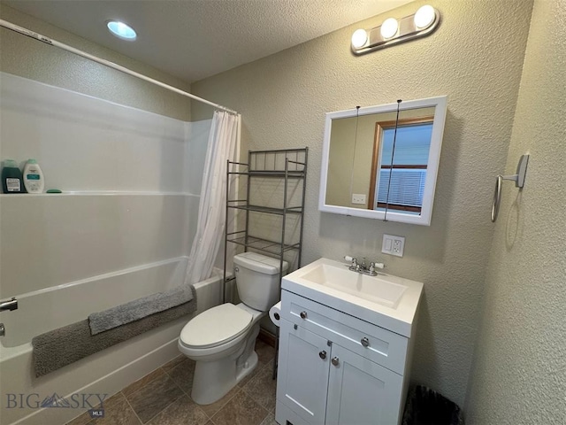 full bathroom with a textured ceiling, shower / tub combo, vanity, and toilet