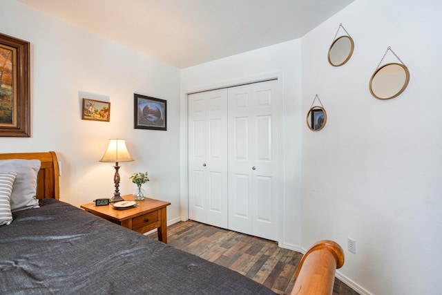 bedroom featuring a closet and dark hardwood / wood-style flooring