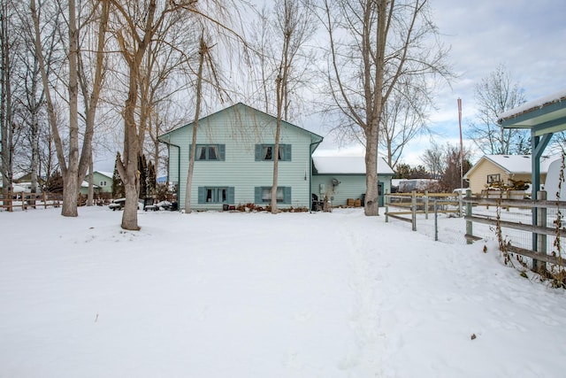 view of snow covered property