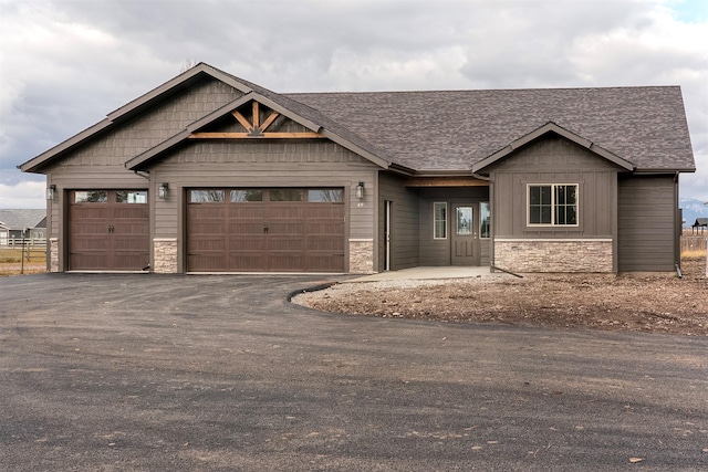 craftsman-style house with a garage