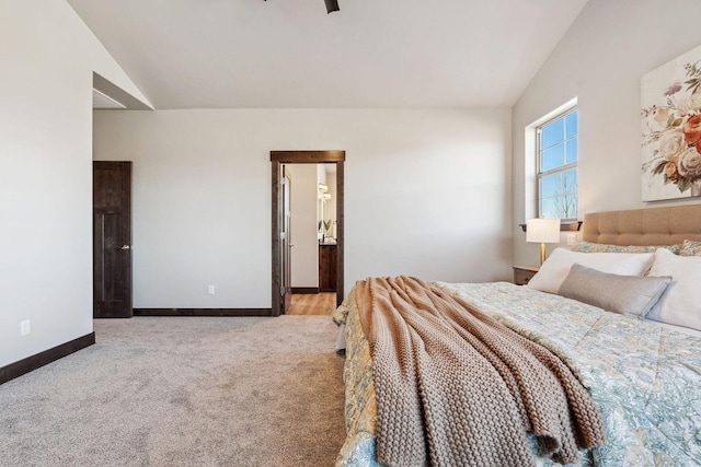 carpeted bedroom featuring ceiling fan, baseboards, and vaulted ceiling