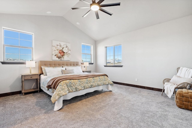 carpeted bedroom featuring high vaulted ceiling, baseboards, and ceiling fan