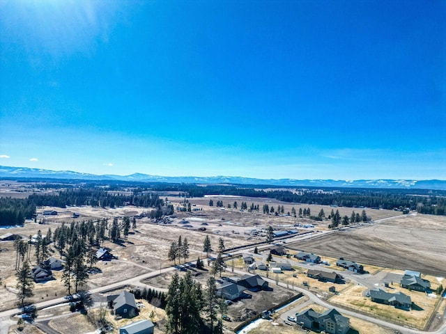 bird's eye view with a mountain view