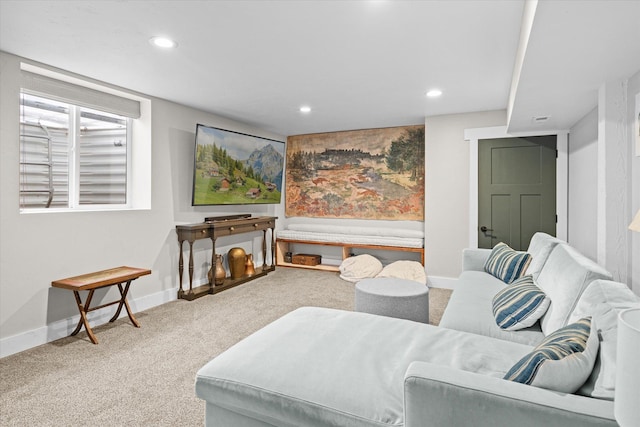 living area with recessed lighting, baseboards, and carpet