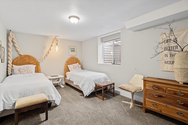 bedroom with carpet flooring and baseboards