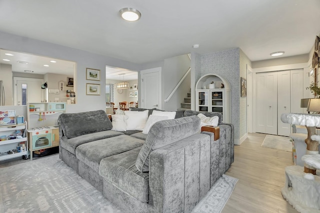 living room with light hardwood / wood-style floors