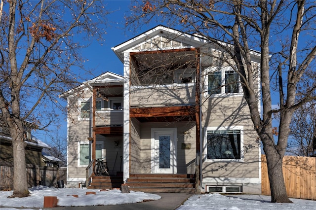 view of front of home with a balcony