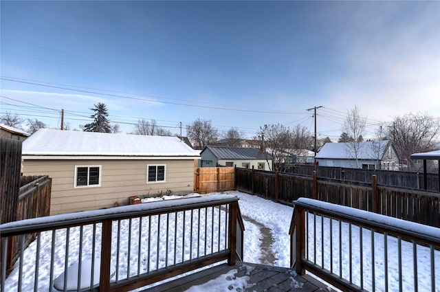 view of snow covered deck