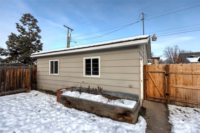 view of snow covered property