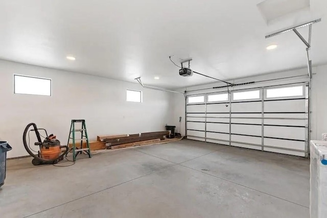 garage featuring a garage door opener