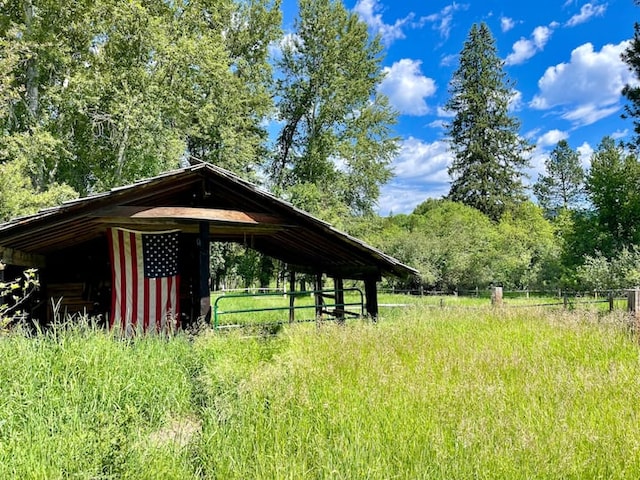 view of property's community featuring an outbuilding