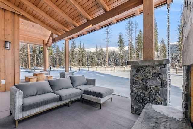 view of snow covered patio