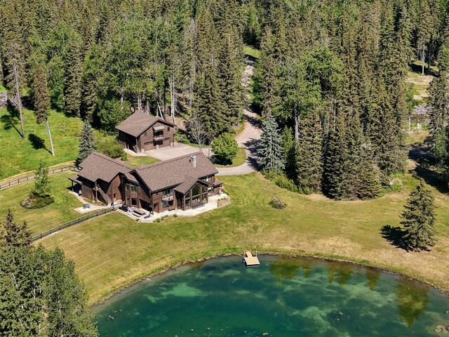 190 Black Bear Ln, Bigfork, MT 59911 - aerial view of property and surrounding area with a heavily wooded area and a nearby body of water