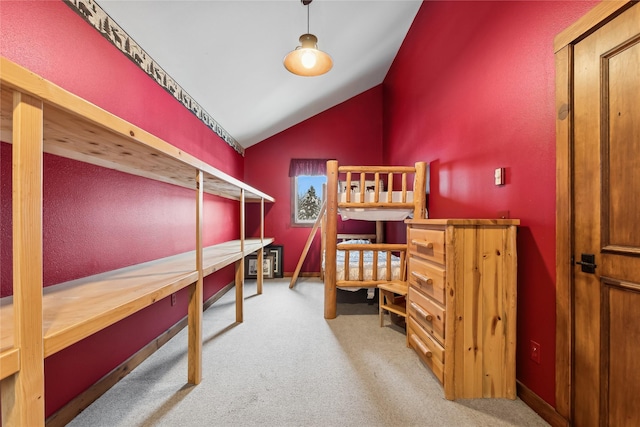 190 Black Bear Ln, Bigfork, MT 59911 - carpeted bedroom with lofted ceiling