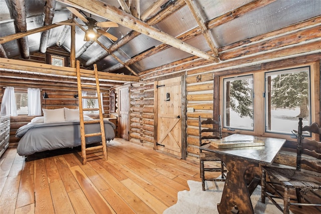 bedroom with hardwood / wood-style flooring, wooden ceiling, rustic walls, and lofted ceiling with beams