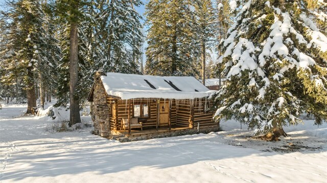 190 Black Bear Ln, Bigfork, MT 59911 - view of front of home with a porch