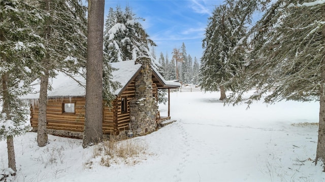 view of snow covered property