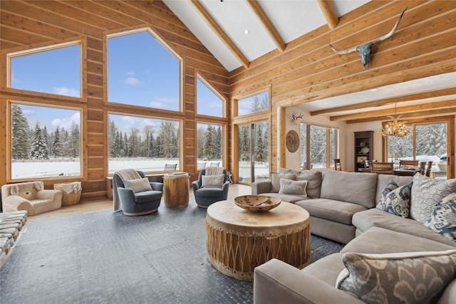 190 Black Bear Ln, Bigfork, MT 59911 - living room with a chandelier, high vaulted ceiling, beamed ceiling, and wooden walls